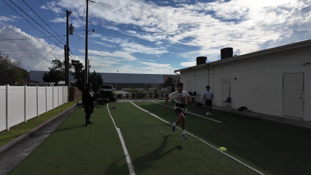Athlete using advanced T-Apex overspeed system in New Port Richey for speed development.
